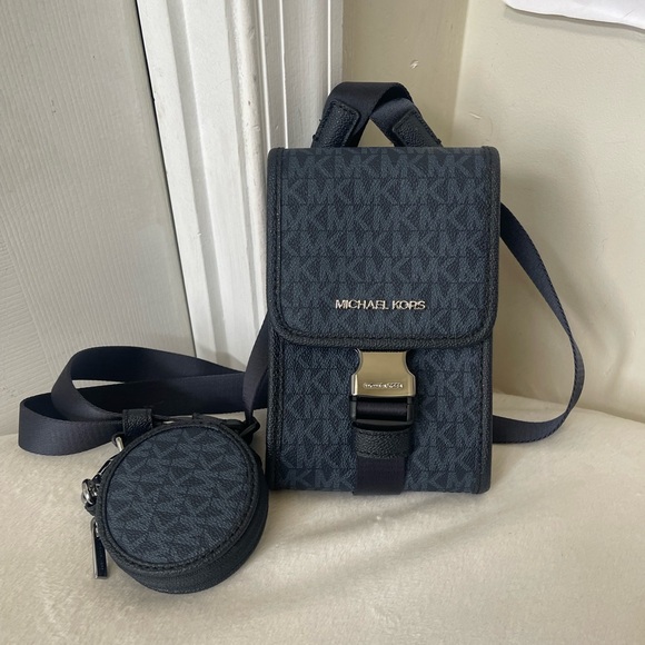 Michael Kors Handbags - Michael Kors Slim Crossbody bag with a removable coin purse. NWOT